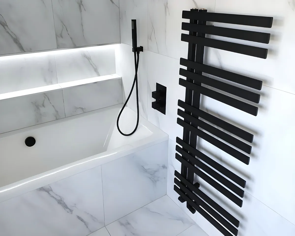 Luxury white bathroom with brushed gold fixtures